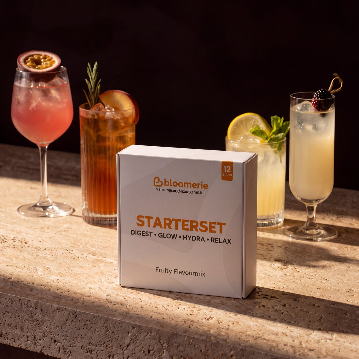 bloomerie® Starterset vor vier Drinks an der Bar